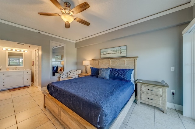 tiled bedroom with ceiling fan, ornamental molding, and ensuite bathroom