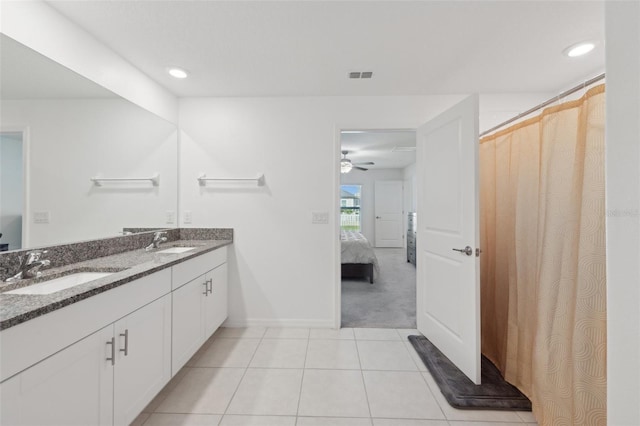 bathroom with vanity, tile patterned floors, ceiling fan, and curtained shower