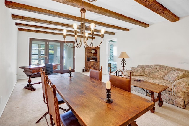 dining space featuring french doors, light colored carpet, a notable chandelier, and beam ceiling