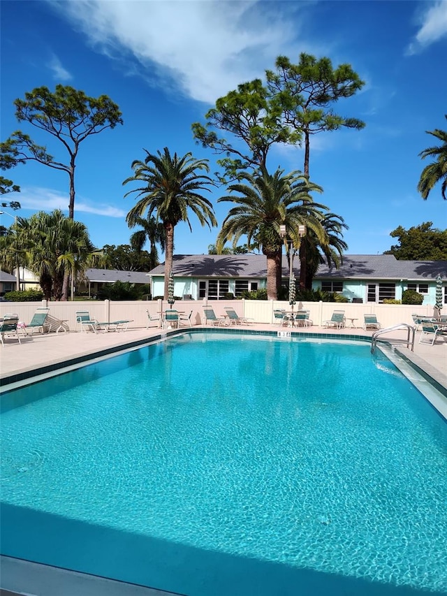 view of swimming pool with a patio area