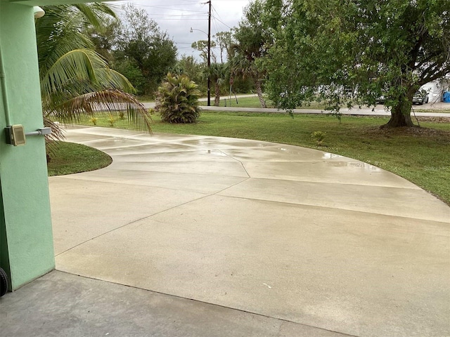 view of property's community with a yard