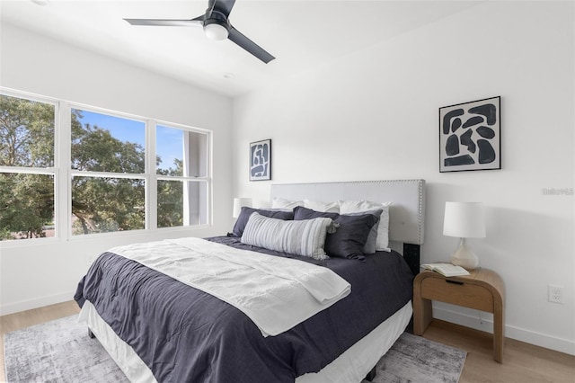 bedroom featuring ceiling fan and wood-type flooring