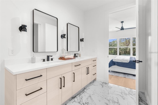 bathroom featuring wood-type flooring, vanity, and ceiling fan