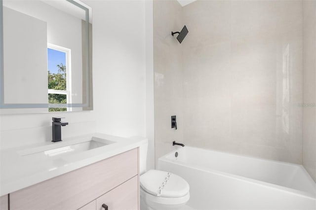 full bathroom with tiled shower / bath combo, toilet, and vanity