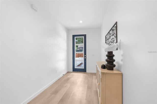 doorway with light hardwood / wood-style floors