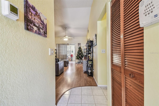 hallway with light wood-type flooring