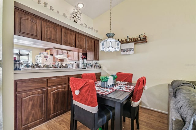 dining space featuring light hardwood / wood-style floors