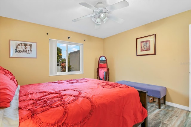 bedroom featuring ceiling fan and light wood-type flooring