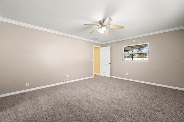 carpeted empty room featuring crown molding and ceiling fan