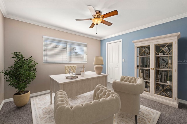 office area with carpet floors, ceiling fan, and crown molding