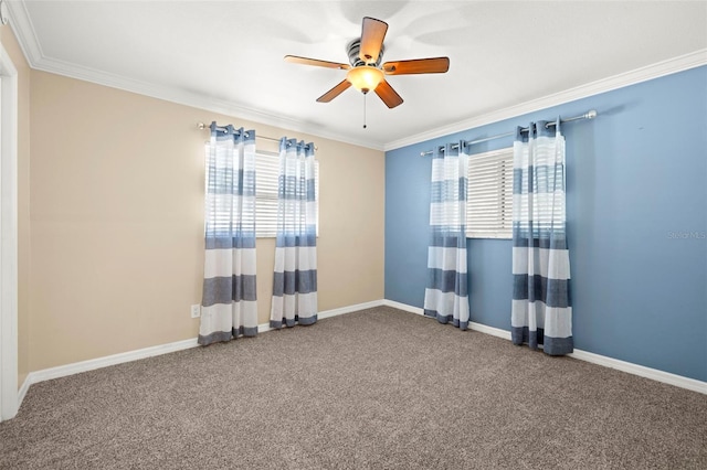 carpeted empty room featuring crown molding and ceiling fan