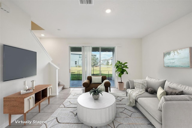 living room with light tile patterned flooring