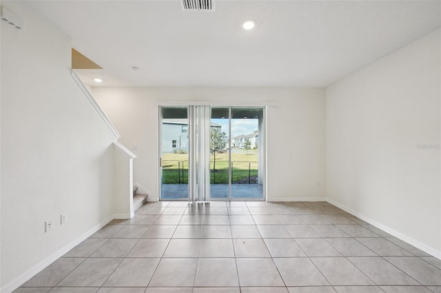 view of tiled spare room