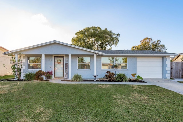 single story home with a front lawn and a garage