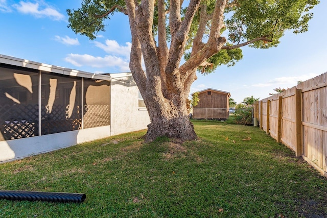 view of yard with a sunroom