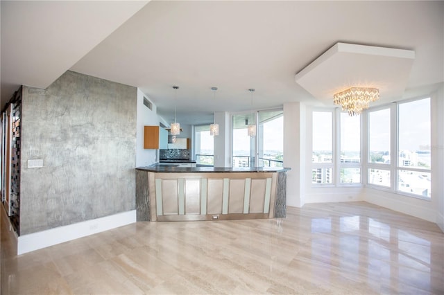 kitchen featuring a chandelier and pendant lighting