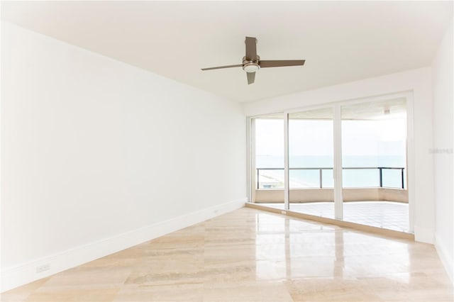 unfurnished room featuring ceiling fan