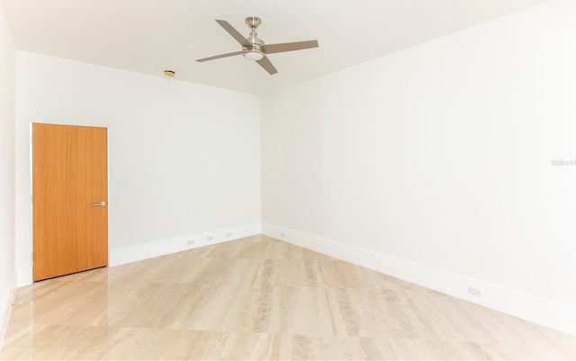 empty room featuring ceiling fan