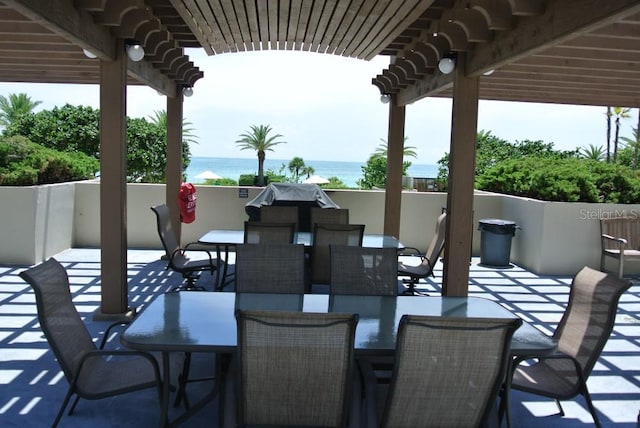 view of patio / terrace featuring a water view