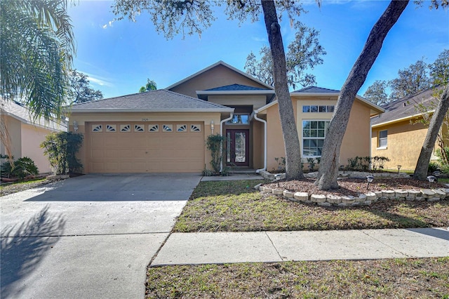 view of front of property featuring a garage