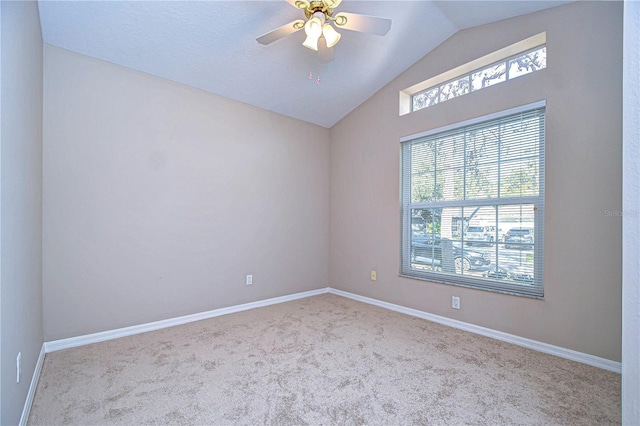 unfurnished room featuring ceiling fan, a healthy amount of sunlight, and light colored carpet