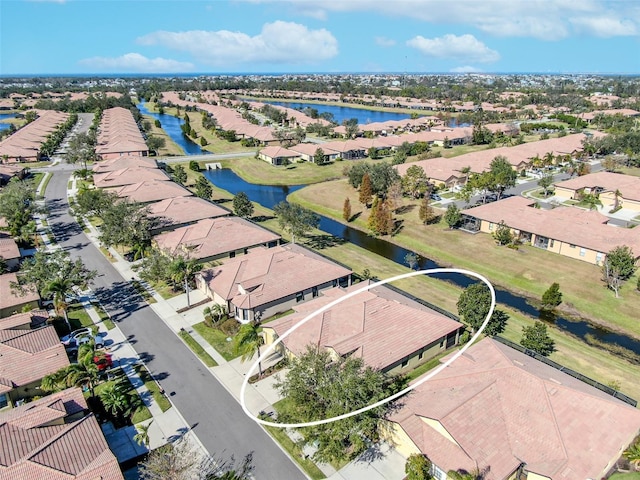 drone / aerial view featuring a water view