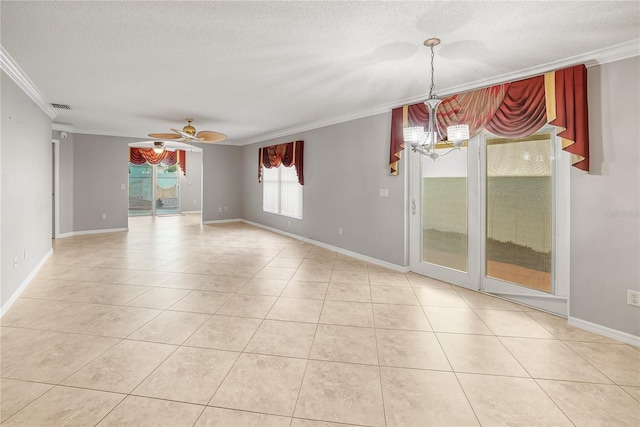 tiled empty room featuring a textured ceiling, ceiling fan with notable chandelier, and crown molding