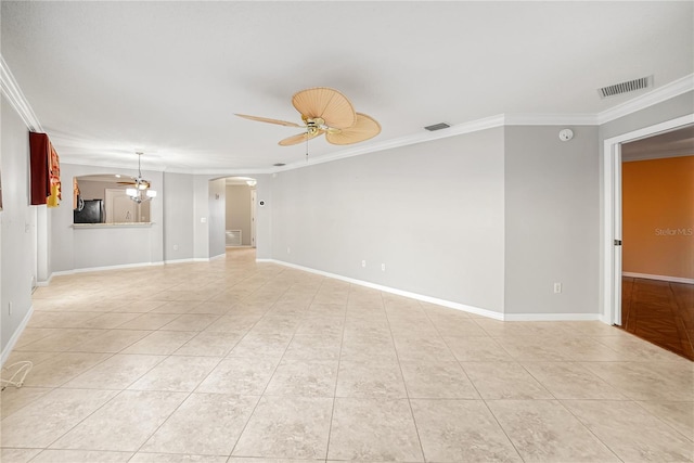 empty room with ceiling fan and ornamental molding