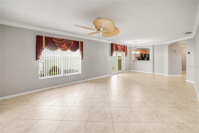 empty room featuring light tile patterned floors, ceiling fan with notable chandelier, and ornamental molding