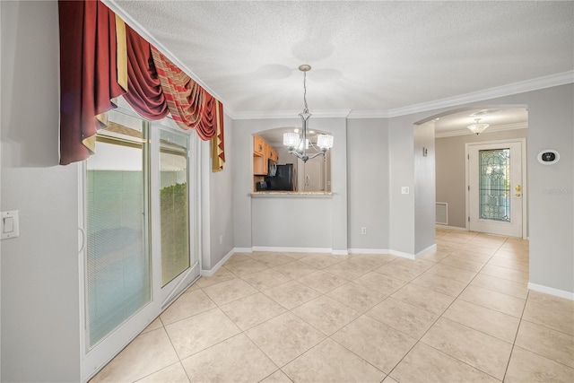 unfurnished dining area with a notable chandelier, a healthy amount of sunlight, ornamental molding, and light tile patterned floors