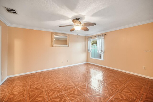 unfurnished room featuring crown molding, light parquet floors, ceiling fan, and a textured ceiling