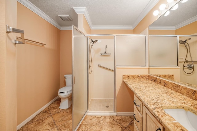 bathroom featuring a textured ceiling, vanity, toilet, and crown molding