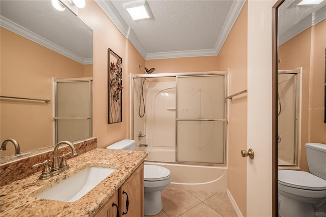 full bathroom featuring bath / shower combo with glass door, crown molding, tile patterned flooring, toilet, and a textured ceiling