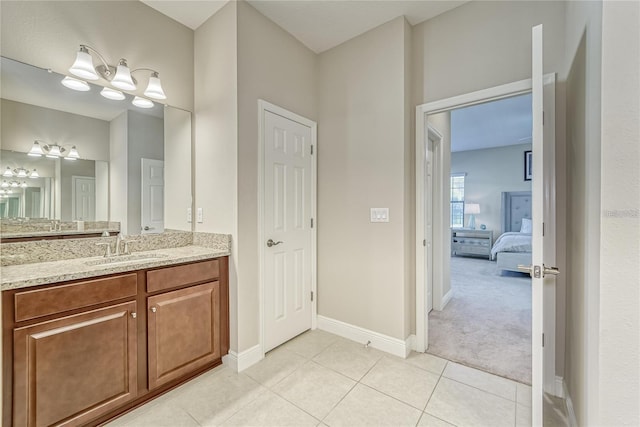 bathroom featuring tile patterned floors and vanity