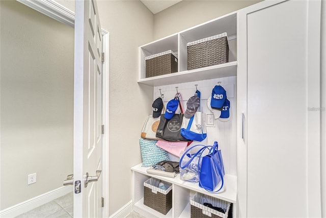 mudroom with light tile patterned flooring