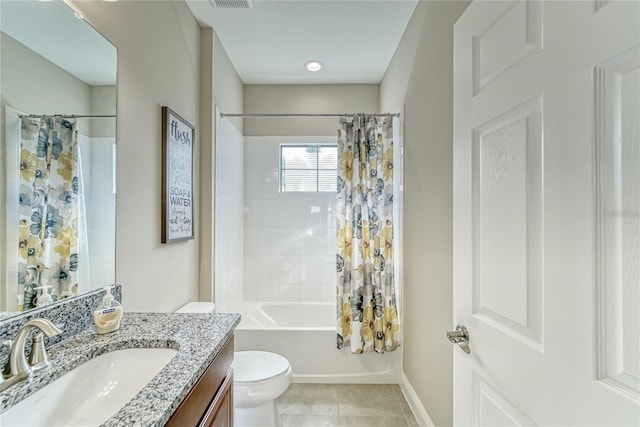 full bathroom with tile patterned floors, vanity, shower / bath combination with curtain, and toilet