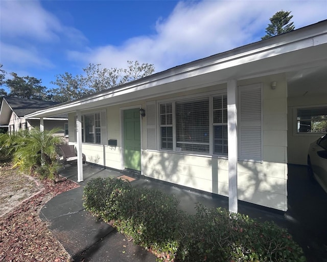 view of home's exterior with a porch