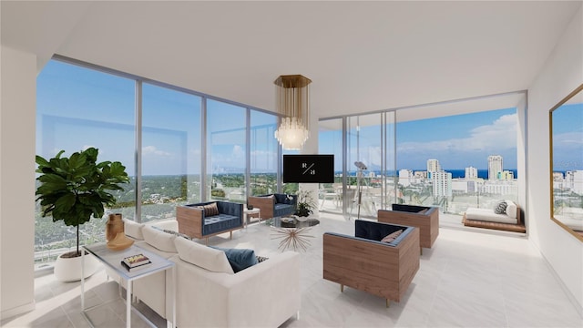 living room featuring a wall of windows and light tile patterned floors