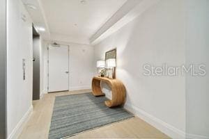 hallway featuring light wood-type flooring