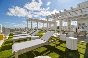 view of property's community featuring a pergola