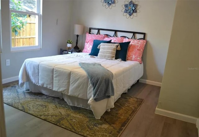 bedroom featuring hardwood / wood-style floors