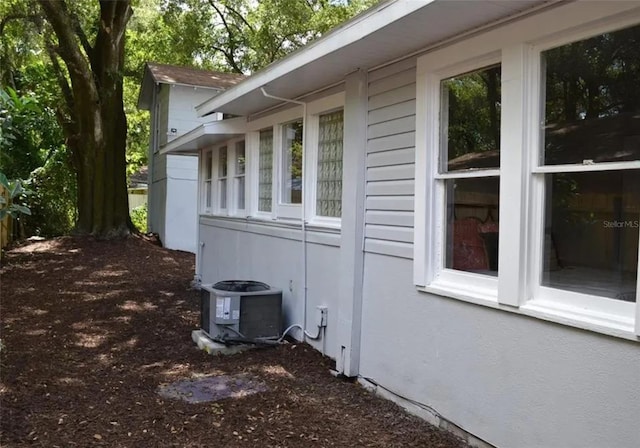 view of home's exterior featuring central AC unit