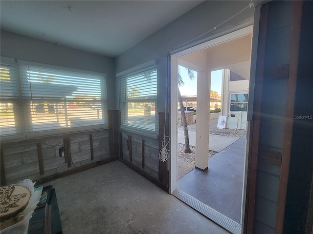 entryway featuring concrete floors