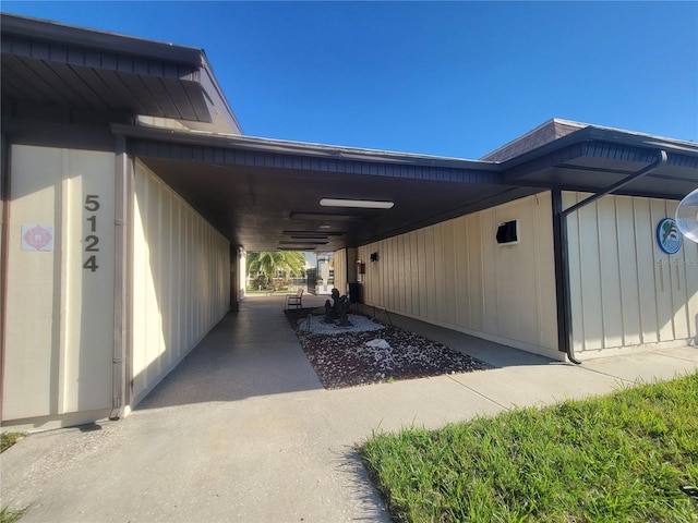 view of side of home featuring a carport