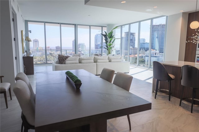 dining room with floor to ceiling windows