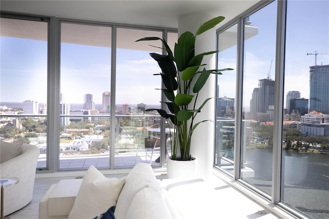 777 3rd Ave N Unit 1605, Saint Petersburg, FL 33701 - bedroom featuring a wall of windows, a skyline view, and multiple windows