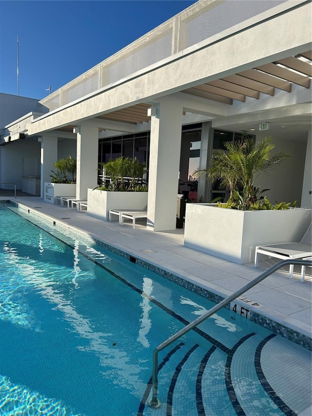 view of pool with a patio area