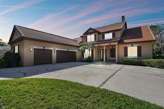 view of front of home featuring a garage