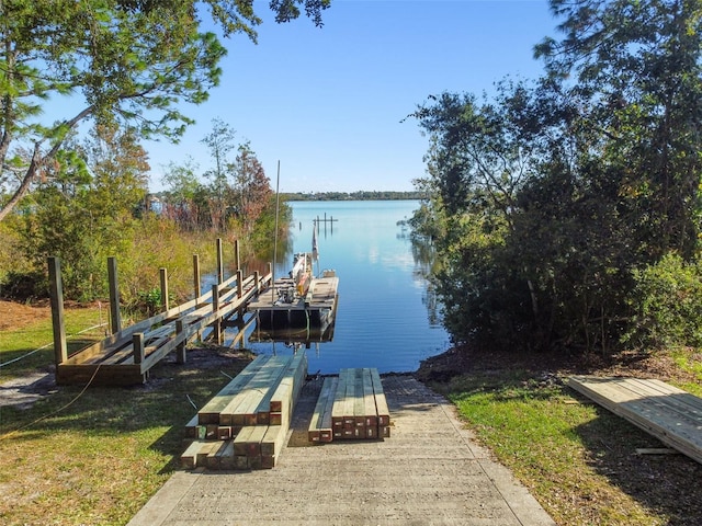 view of dock with a water view