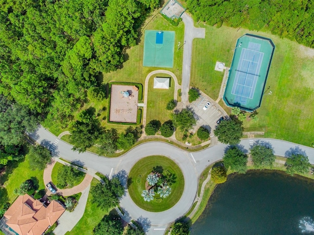 birds eye view of property featuring a water view